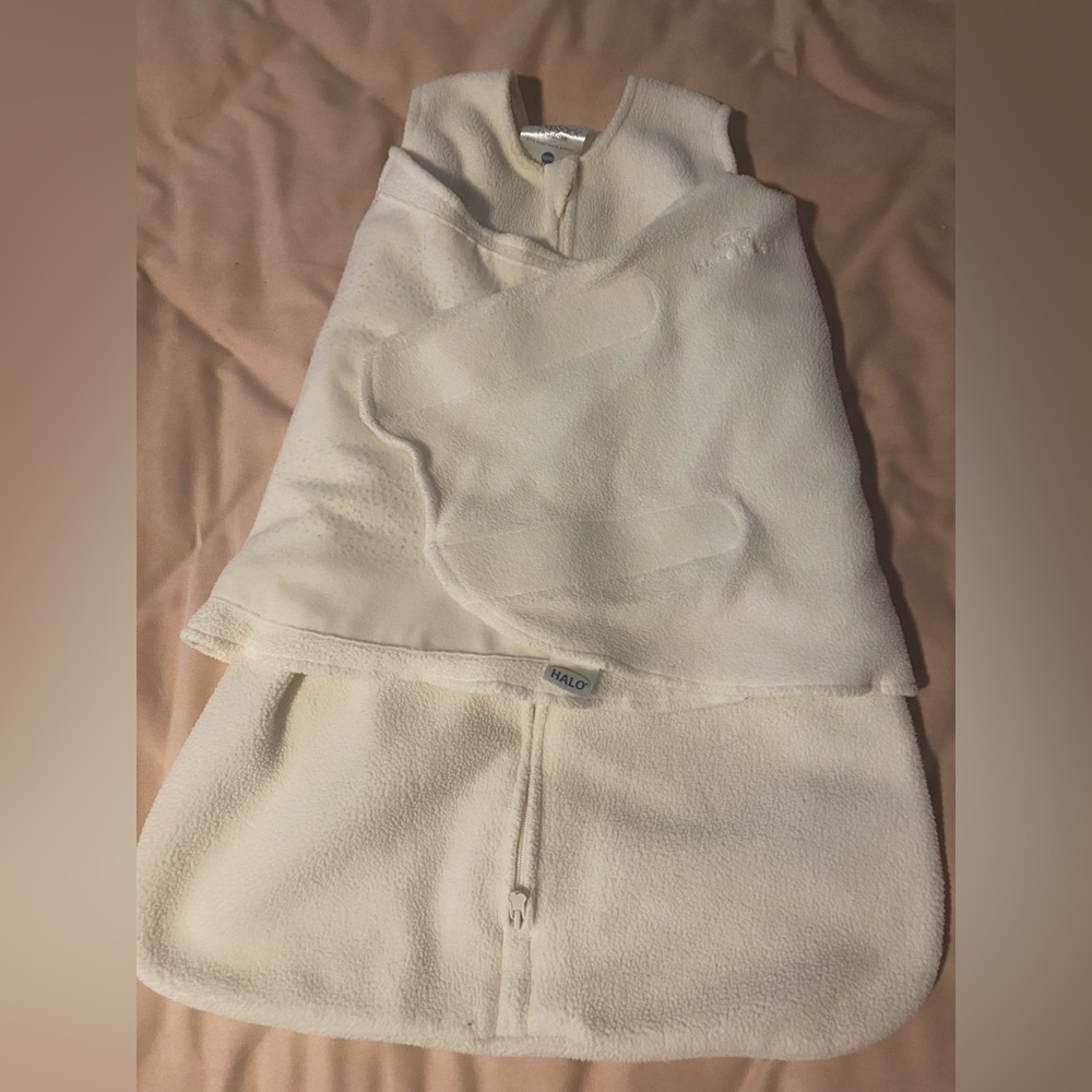 Gently used Halo newborn swaddle in cream